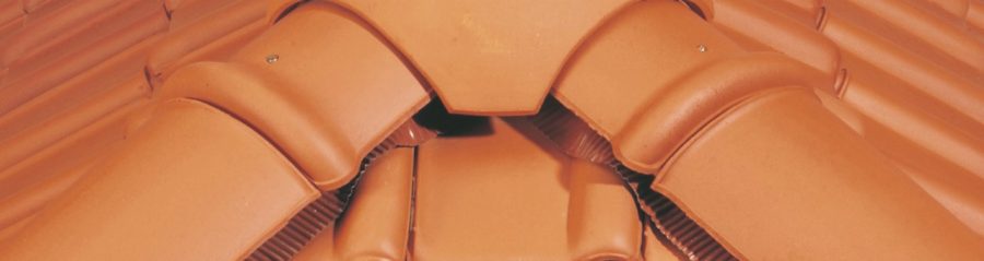 Installing a ridge tile on the roof in a correct way