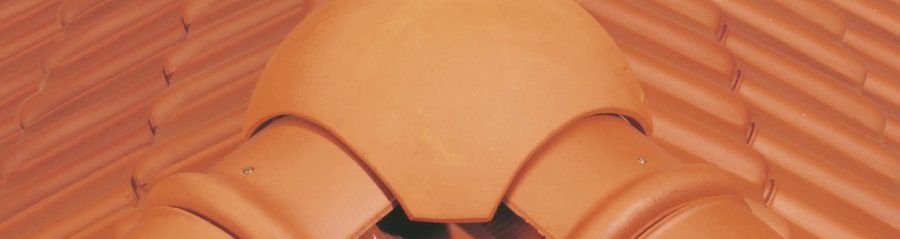 Installing a ridge tile on the roof in a correct way