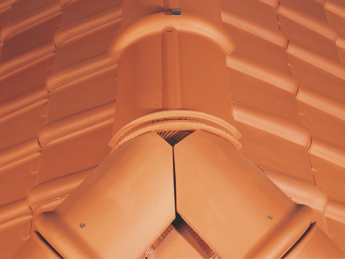 Installing a ridge tile on the roof in a correct way