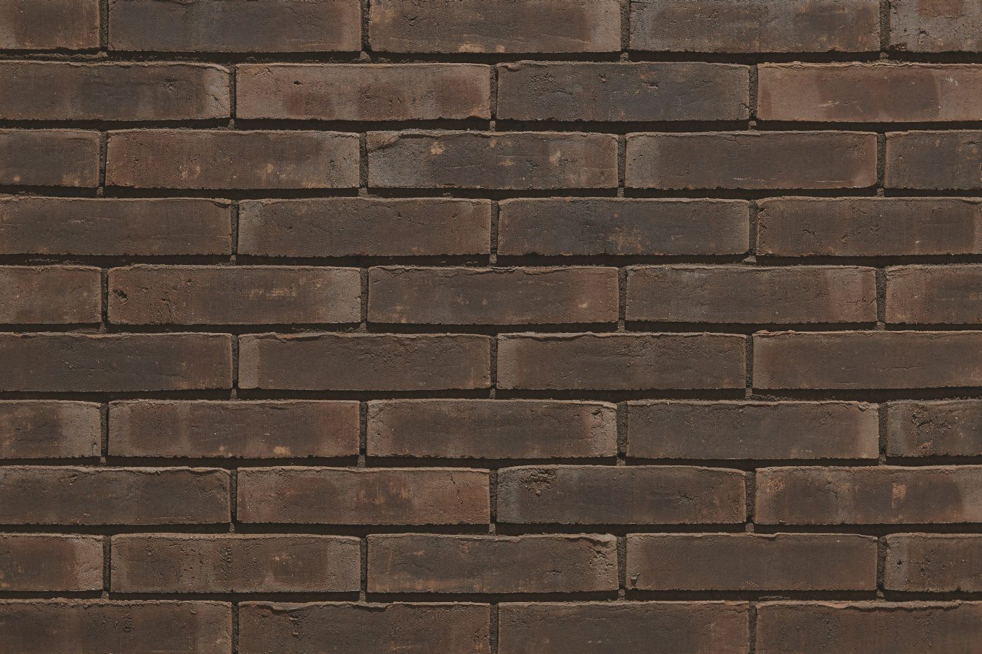 Aquaral Mink Bruin facing bricks in a running bond with thinbed mortar