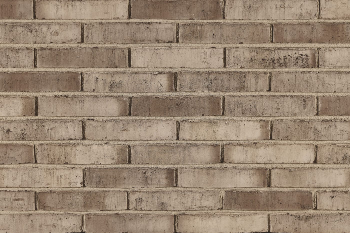 Aquaral Bark Grijs facing bricks in a running bond with mortar