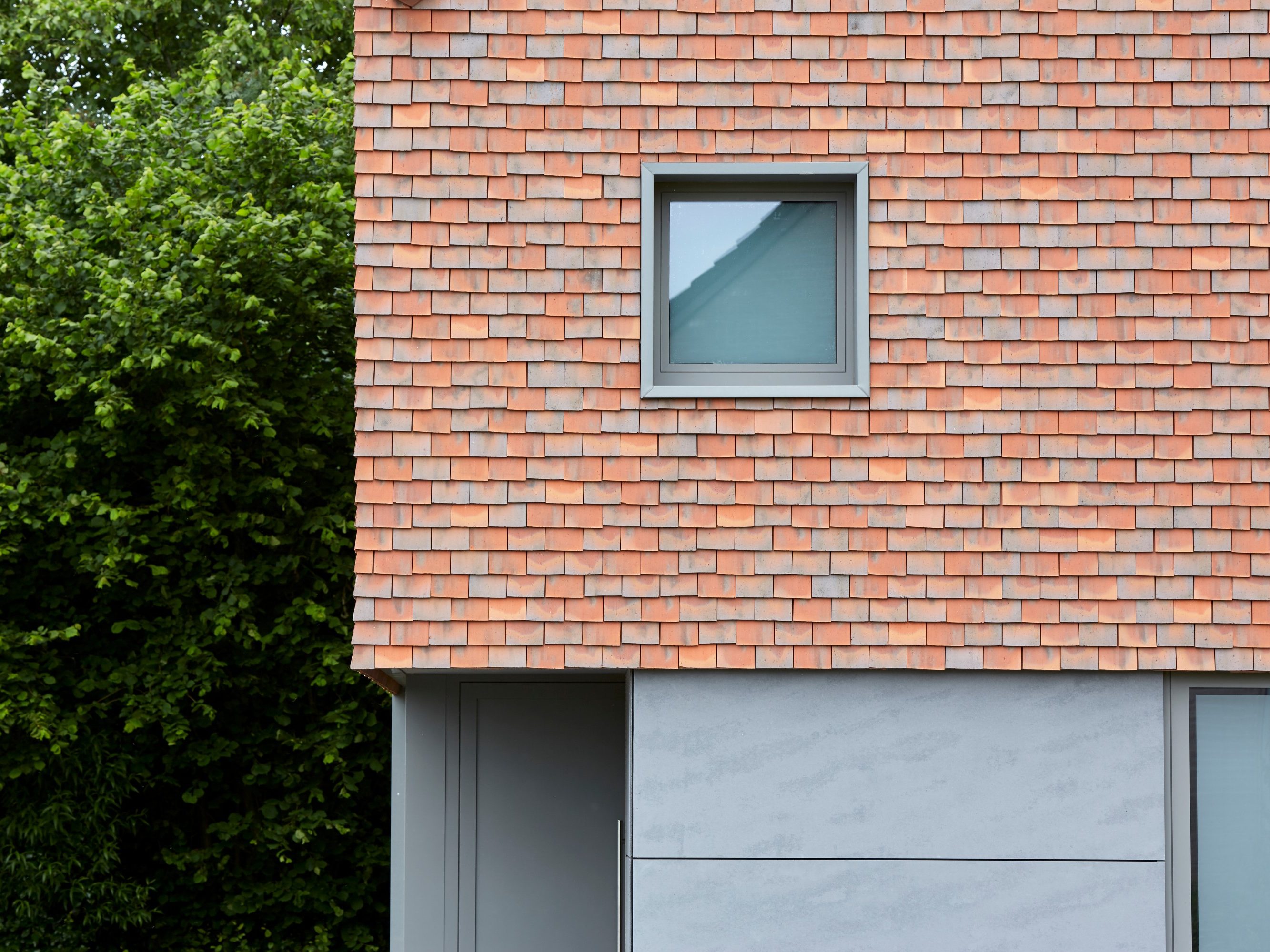 Dakpannen als gevelbekleding