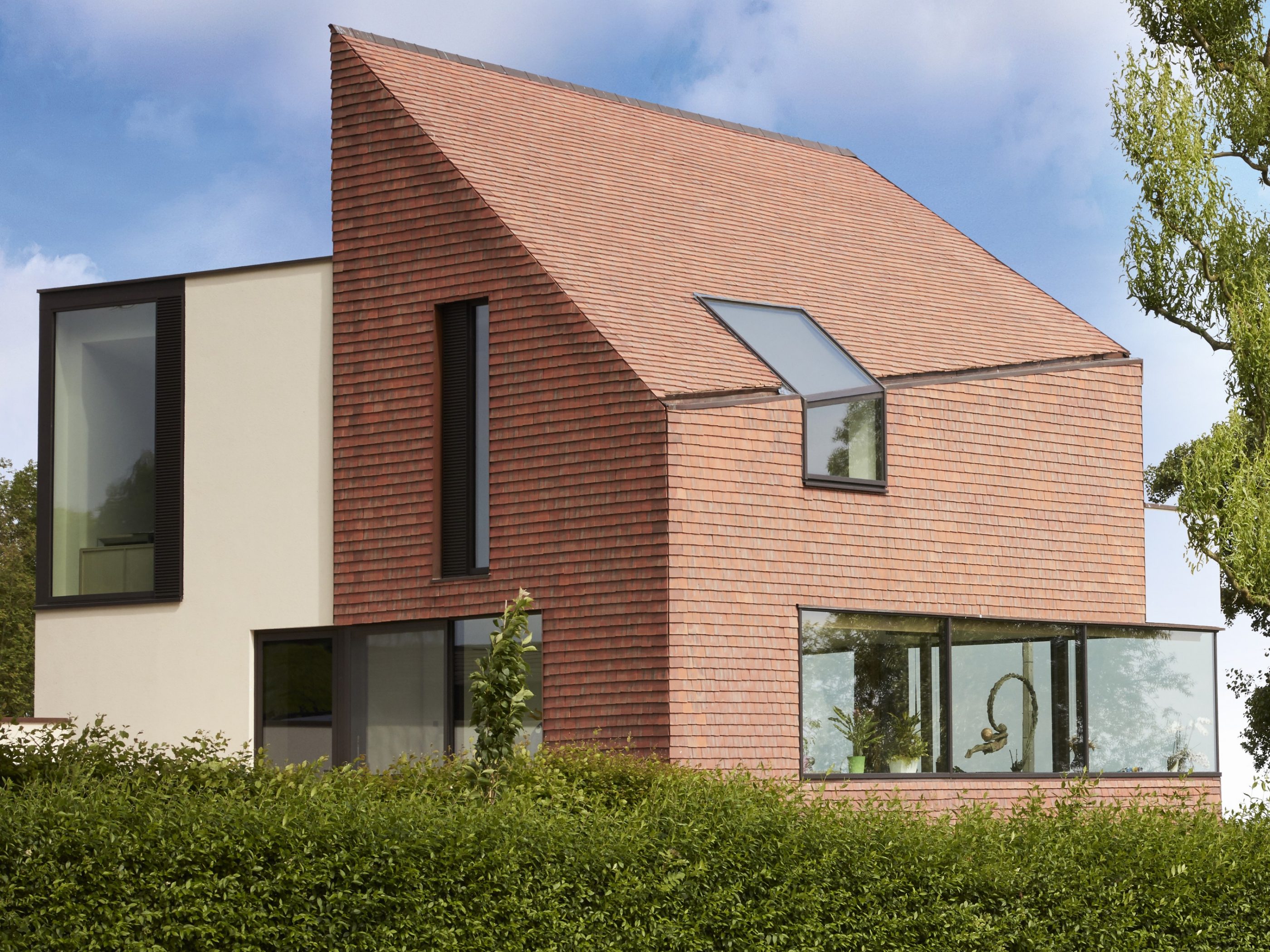 Keramische dakpannen als gevelbekleding