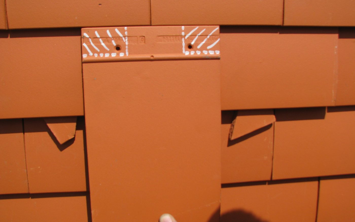 6. Prenez une nouvelle tuile et éliminez les parties arquées.