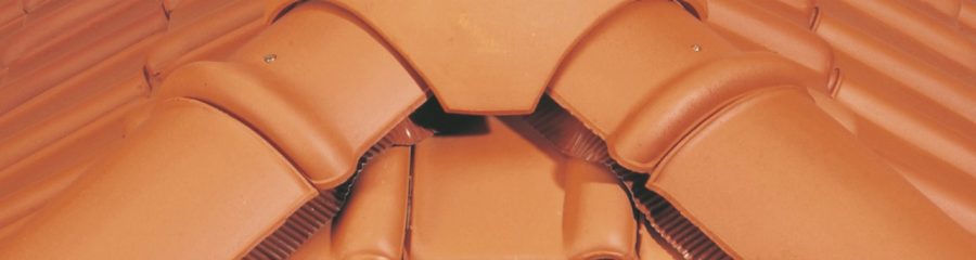 Installing a ridge tile on the roof in a correct way