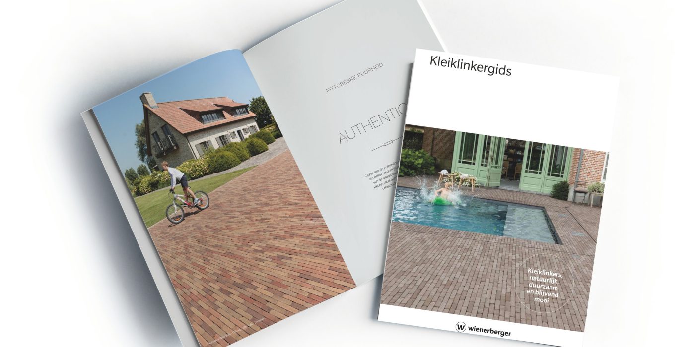 Open and closed blank brochures on grey background, top view. Mock up for design
