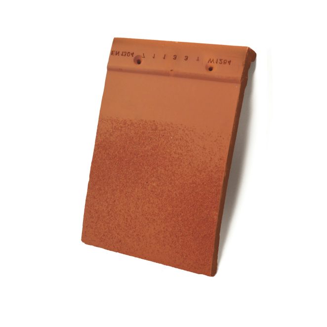 Single product shot of a Tegelpan Rustica Rossa roof tile